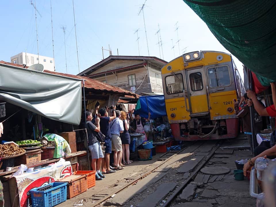 Maeklong Railway Market is a must go places when you plan for Bangkok Trip. This market is unique because it located by the train line.