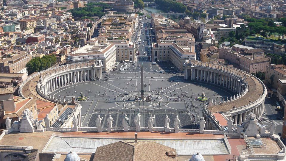 St. Peter's Square is a big plaza located in front of St. Peter's Basilica in the Vatican City